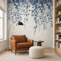 Papier peint motif botanique bleu et beige dans un coin lecture