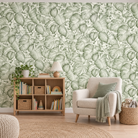 Papier peint jungle monstera vert et blanc dans une salle de jeux et de lecture