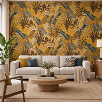 Papier peint jungle botanique jaune ocre et bleu dans un salon