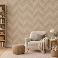 Papier peint chevrons effet parquet beige et crème dans une salle de lecture et de jeux