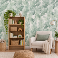Papier peint feuilles tropicales vert et blanc dans un coin lecture