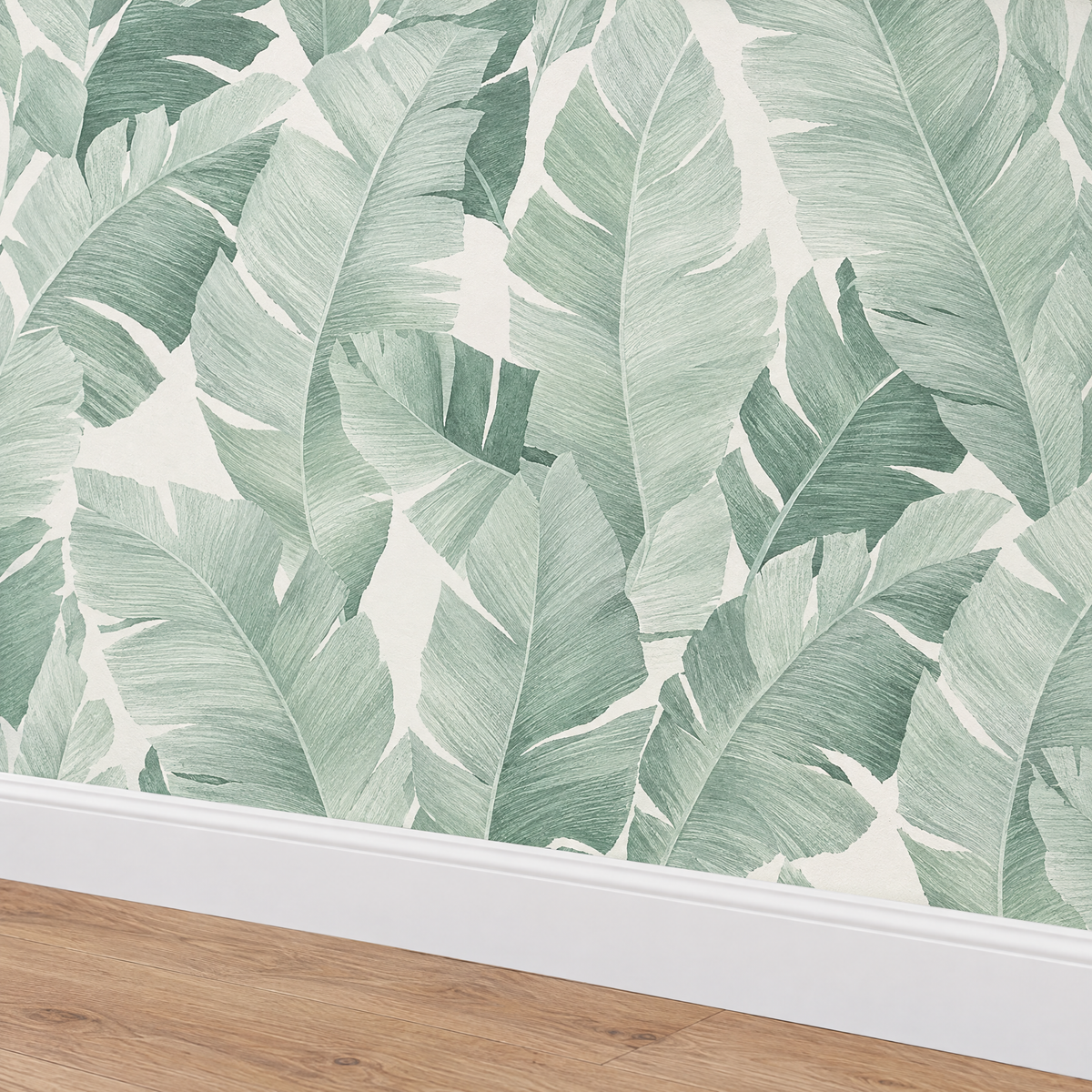 Papier peint feuilles tropicales vert et blanc, détail avec plinthe